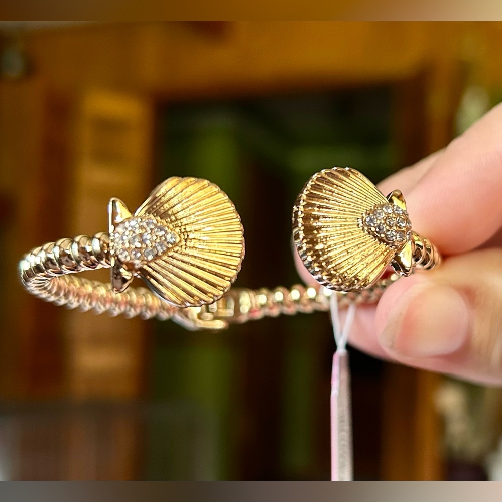 Lilly Pulitzer Gold Seashell Clamper bracelet with rhinestones.